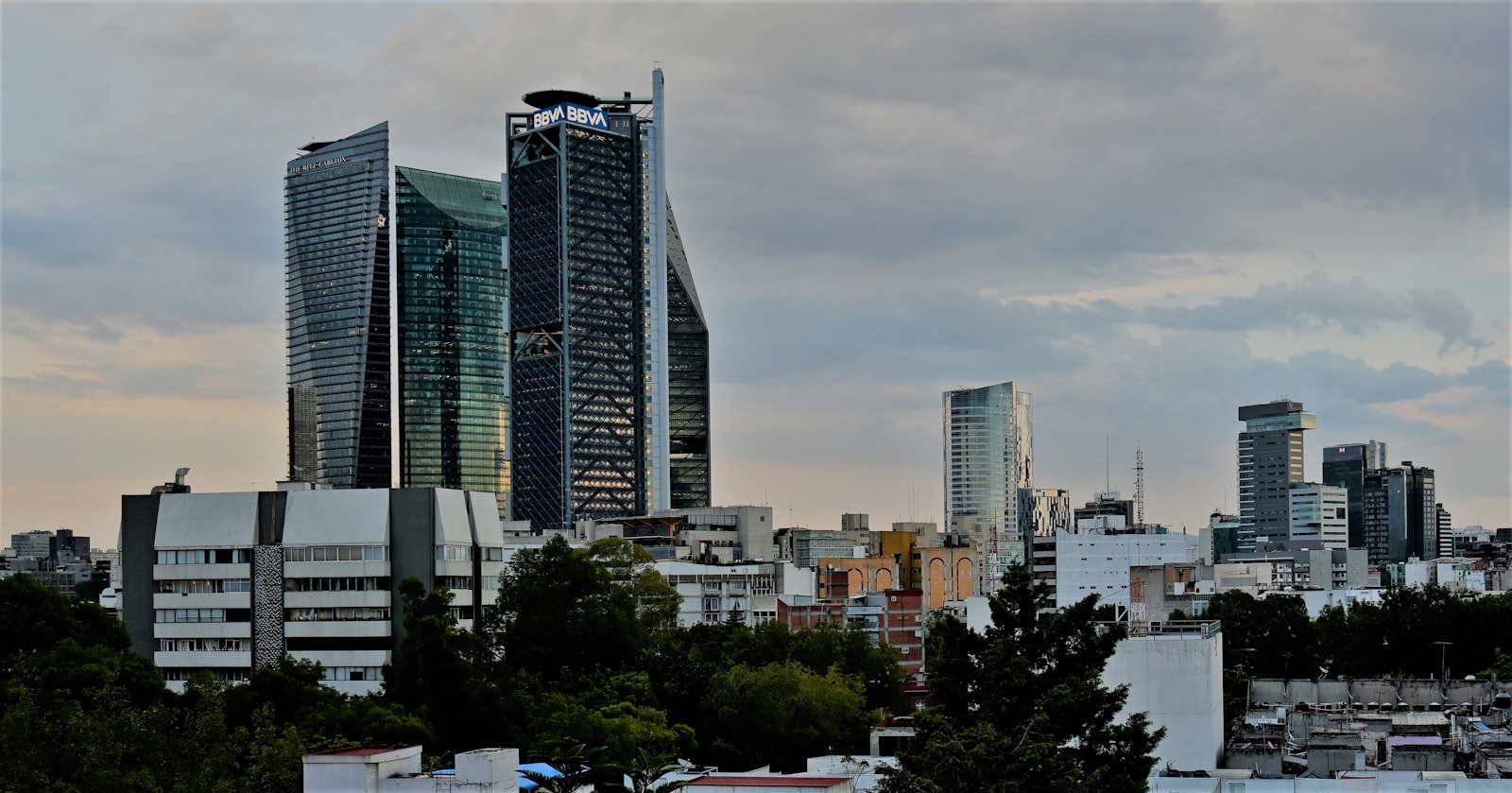 Mexico City corporate district illuminated at night.