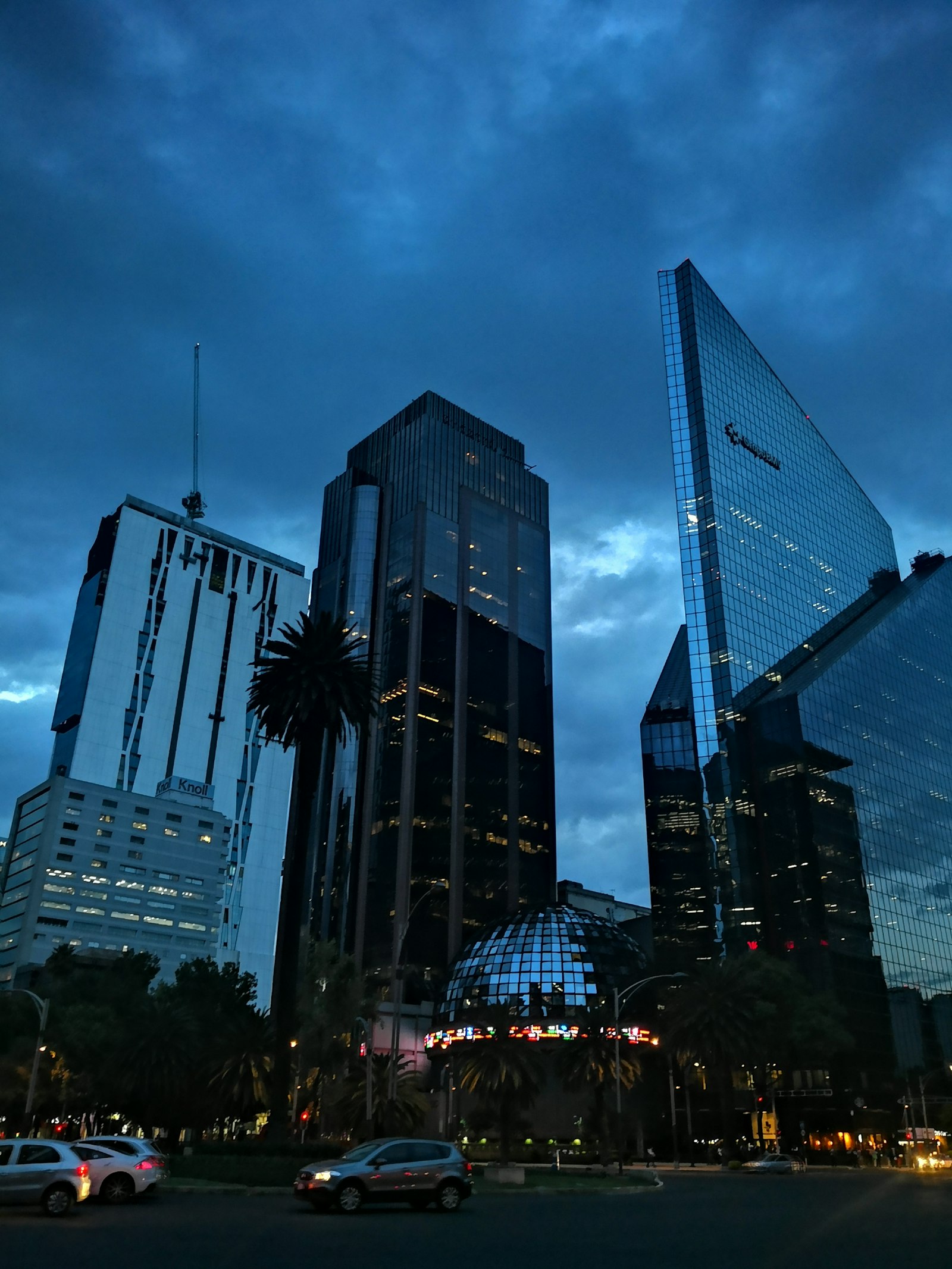 Mexico City corporate district illuminated at night.